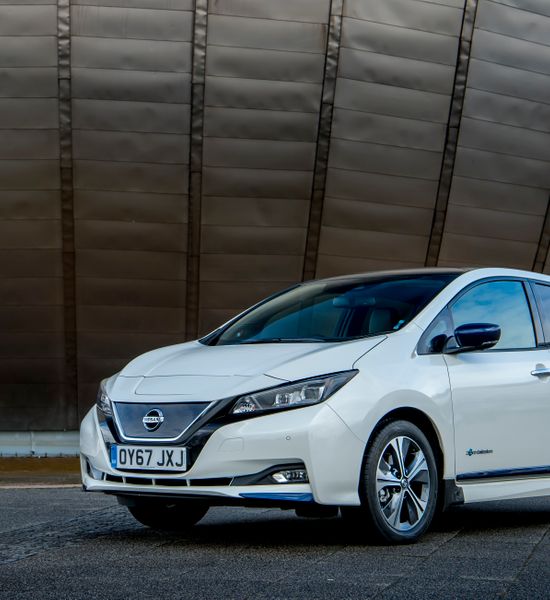 White Nissan Leaf parked